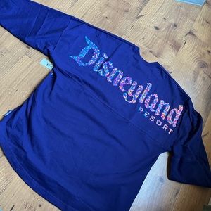 NWT Disney 50th Celebration Dark Purple
Castle Rainbow Confetti Spirit Jersey
